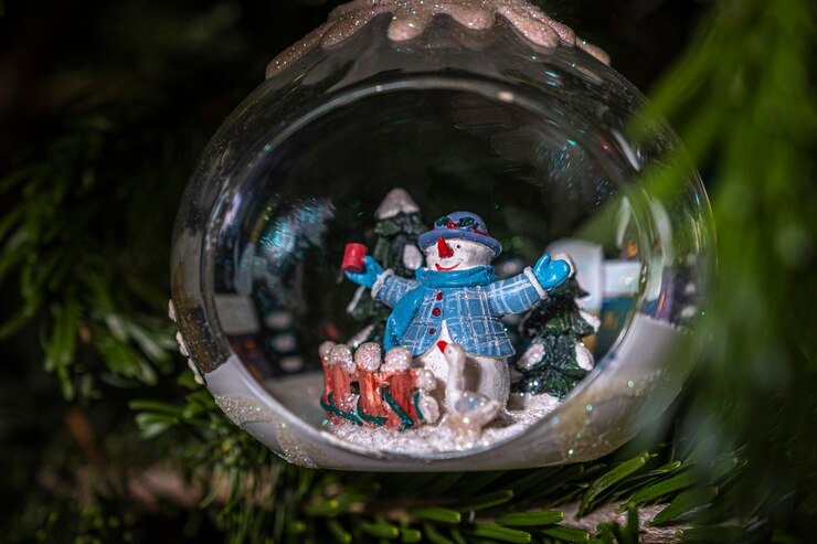 A dreamy snow-globe style camera capturing a magical moment with swirling snow inside.